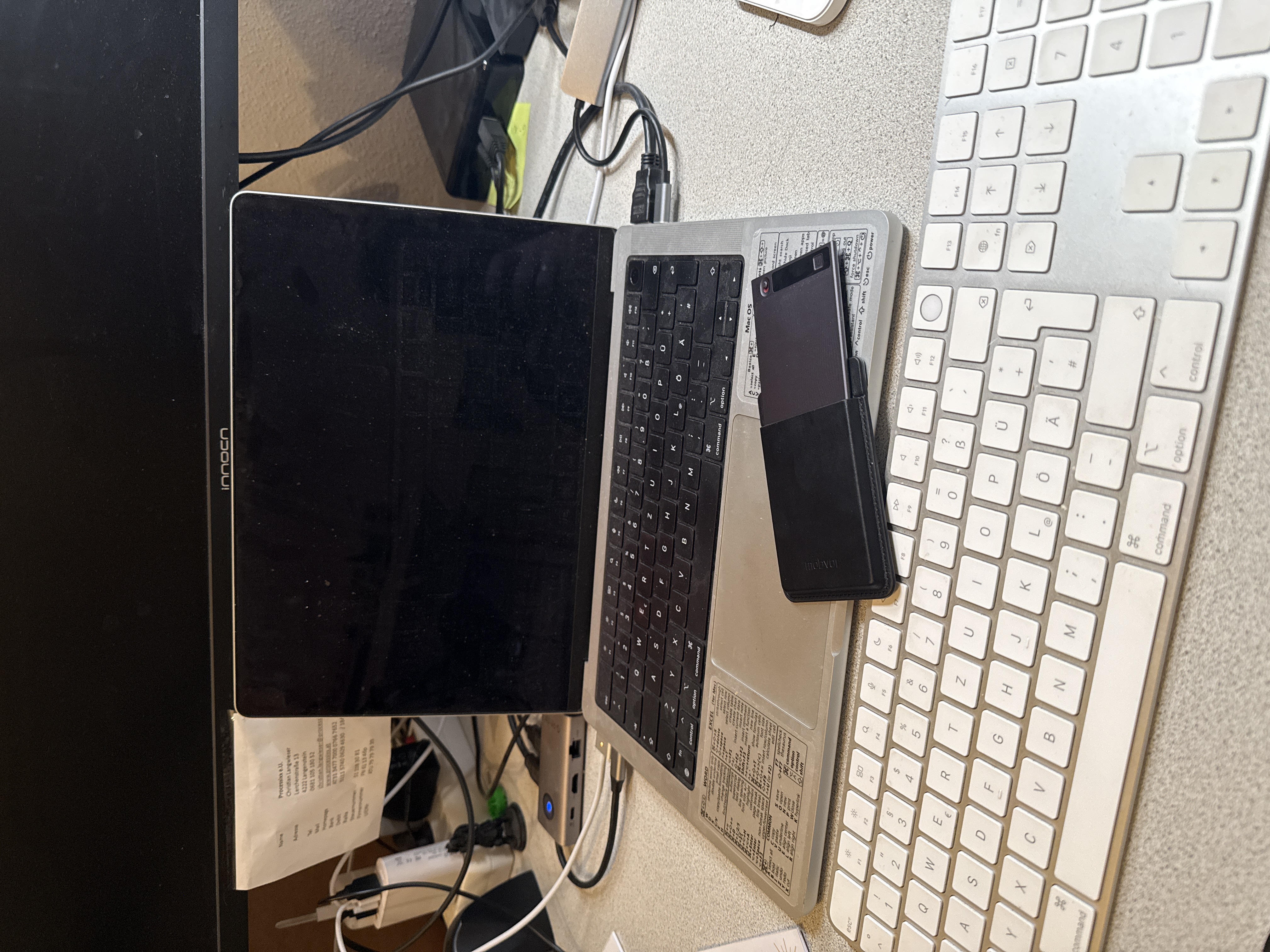 Christian Langwieser's laptop and keyboard workspace setup with TicNote device